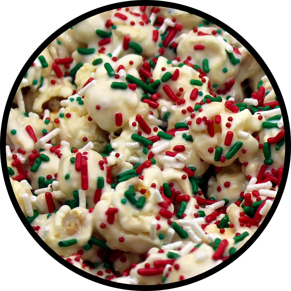 white glazed popcorn with red, green, and white sprinkles